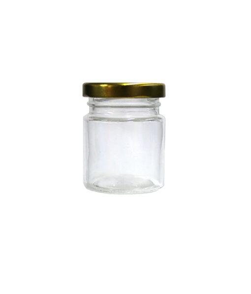 Clear glass storage jar with gold lid in dimensions 5cm x 5cm x 6.5cm