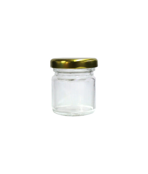 Clear glass storage jar with gold lid in dimensions 5.4cm x 4.4cm x 5.3cm