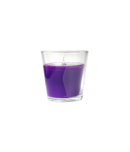 Purple scented candle in glass jar