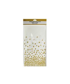 white table cover with gold polka dots