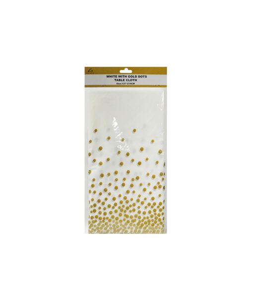 white table cover with gold polka dots