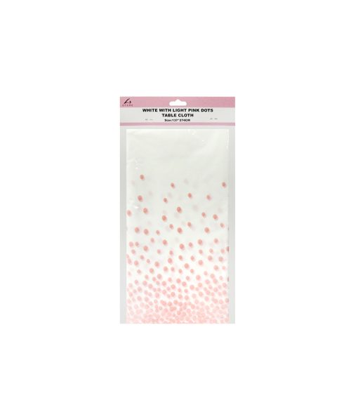 white table cover with pink polka dots