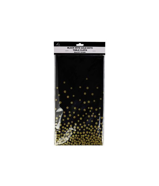 black table cover with gold poka dots